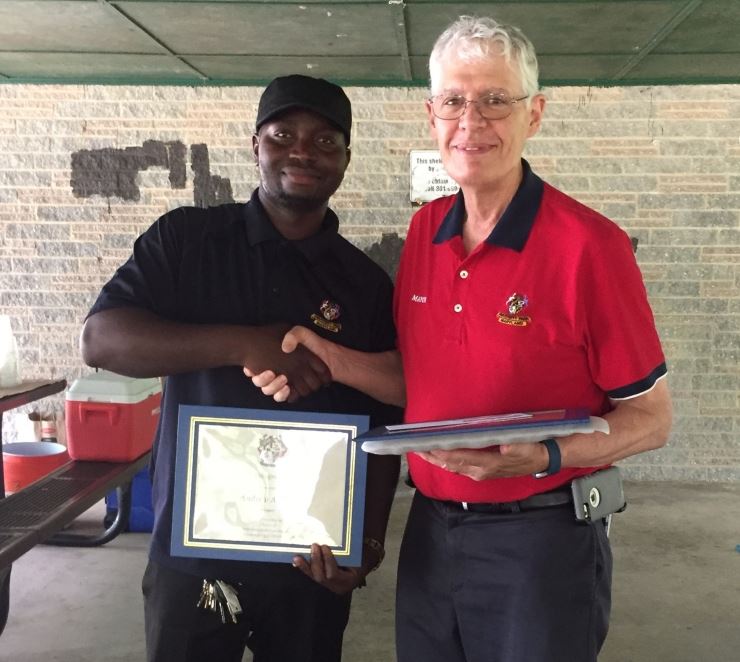 Mayor presenting Andrew Plass award