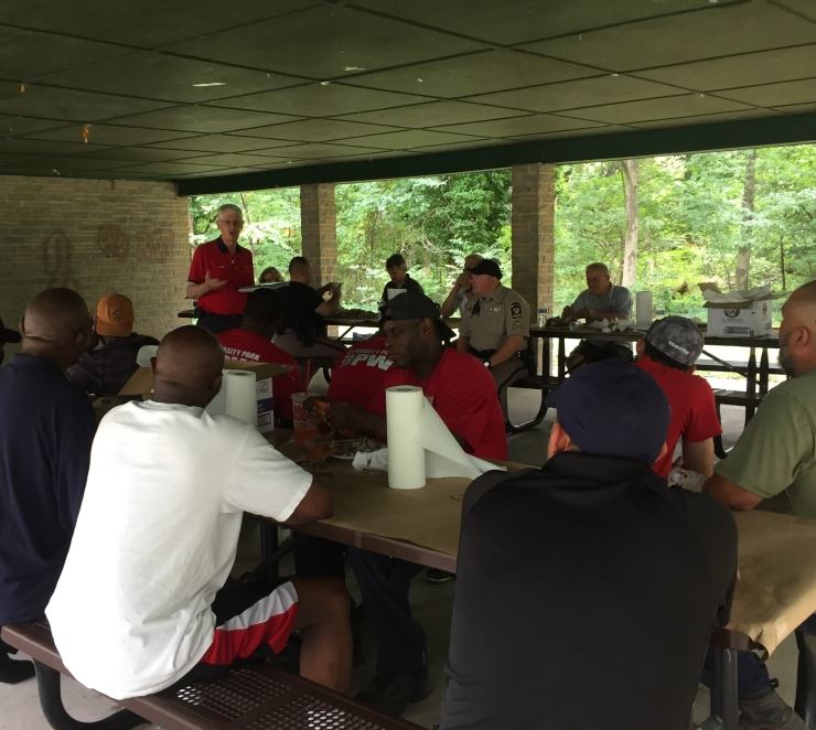 Mayor speaking to staff