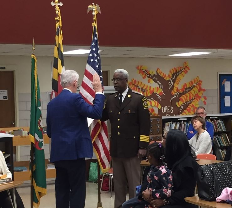 Chief Baker being sworn in by Mayor Carey
