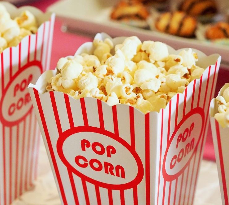 photo of popcorn in a red and white stripped container