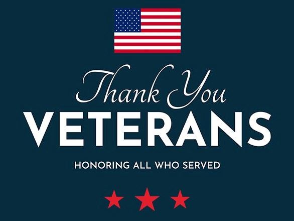 Picture of flag with text honoring veterans for Veterans Day