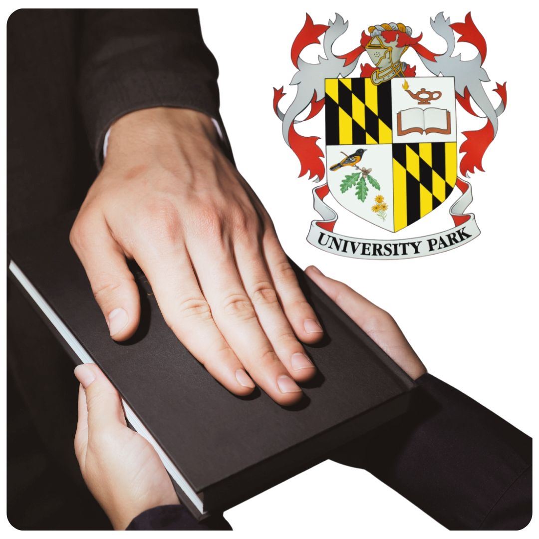 Picture of two hands holding a book and one hand on top