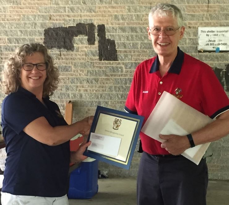 Mayor presenting Tracey Toscano award