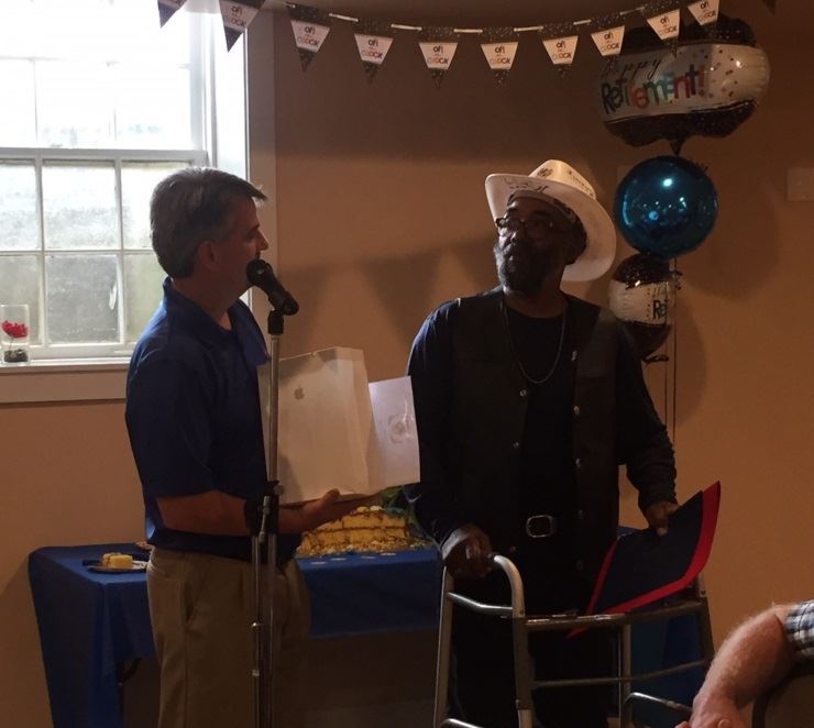 Mickey Beall presents gift