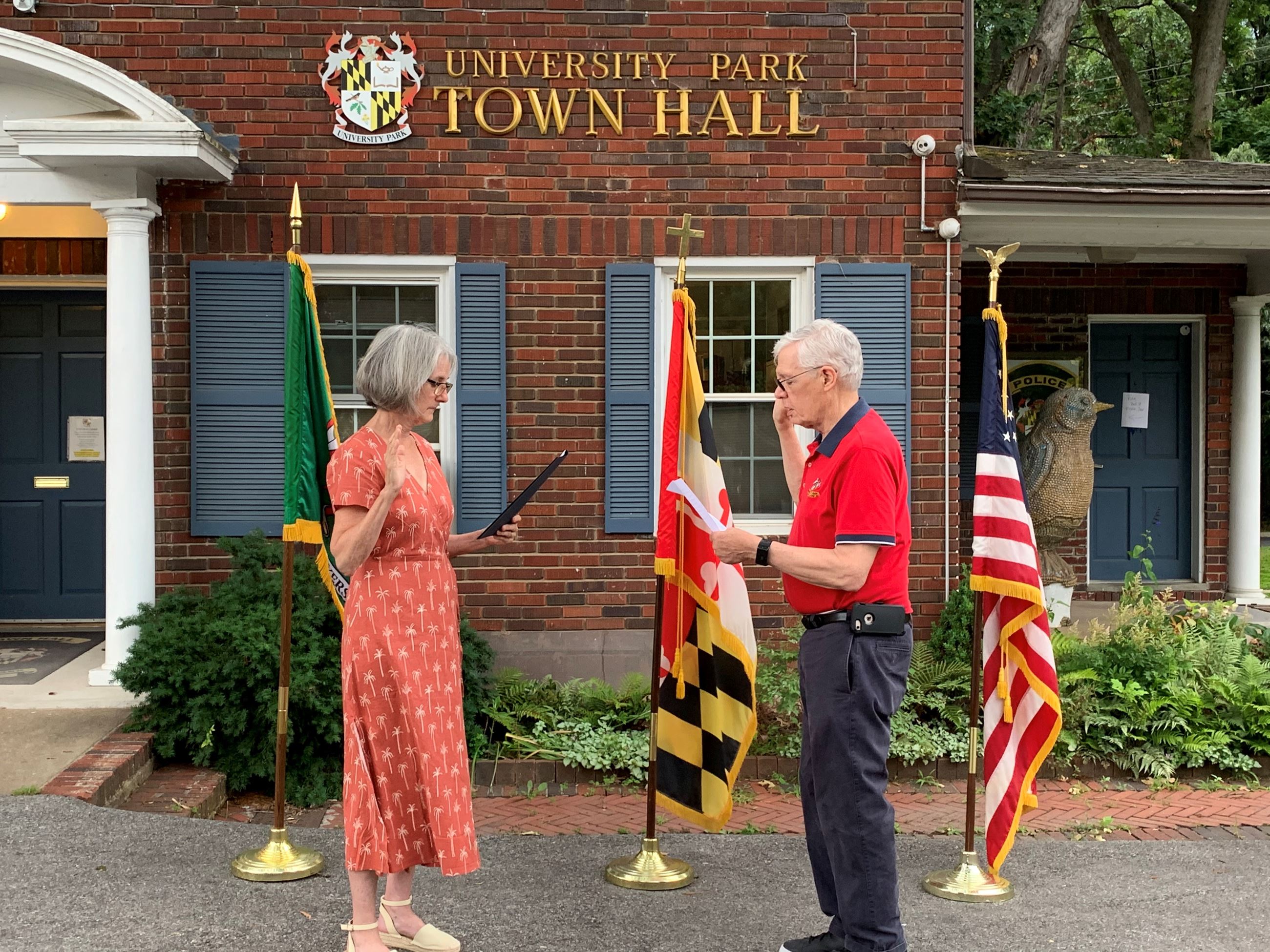 CM Gathercole standing across from Mayor Careys reading the Oath of Office in front of Town Hall