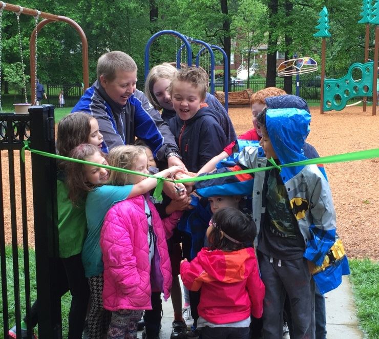 Kids cutting ribbon